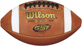 A Wilson GST football featuring a classic design with black and white panels, ideal for outdoor play and practice.